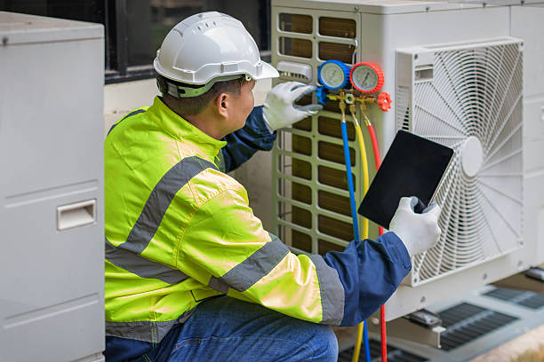 Professional Hvac technician working in Hendersonville, NC